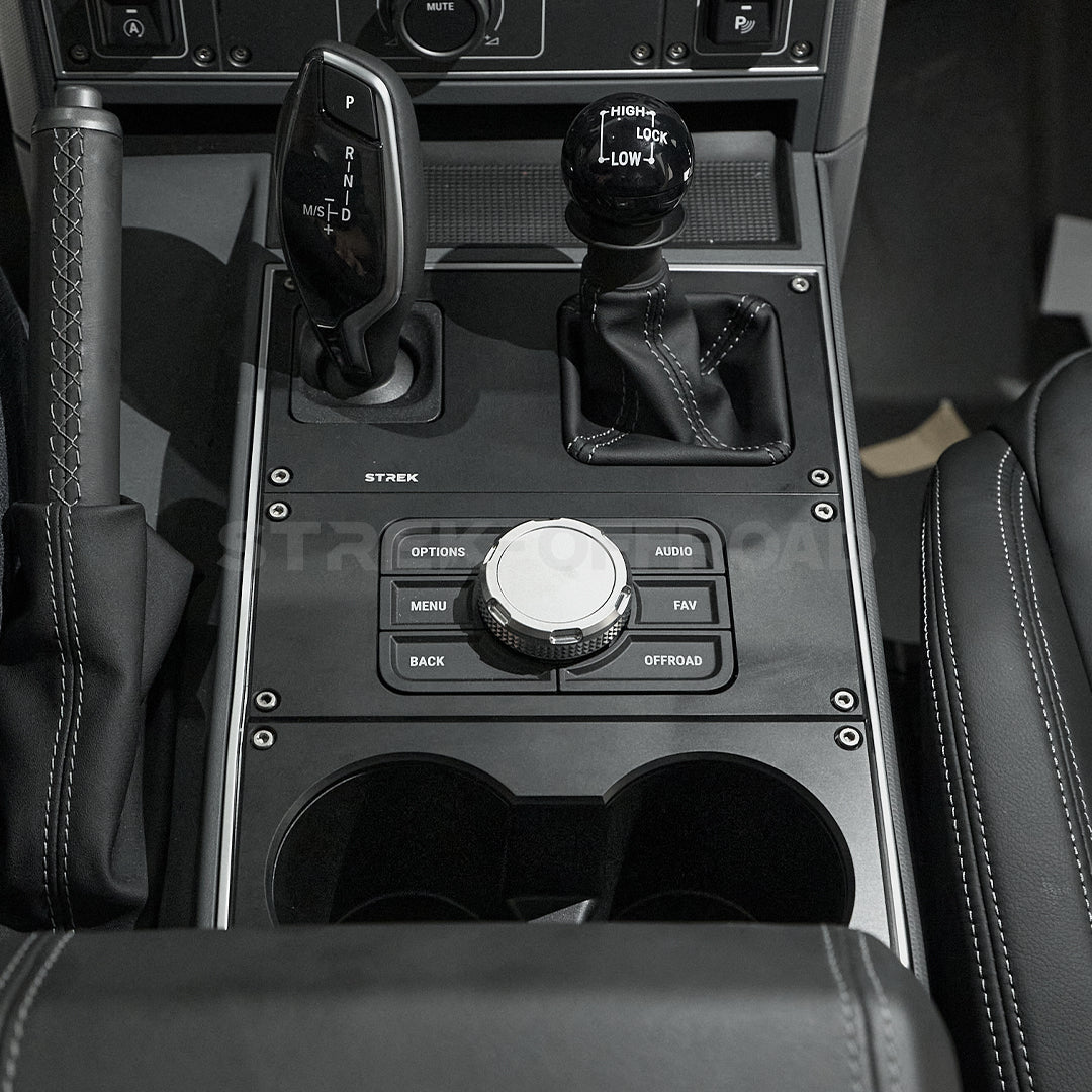 Matte black aluminum cup holder installed in Ineos Grenadier center console