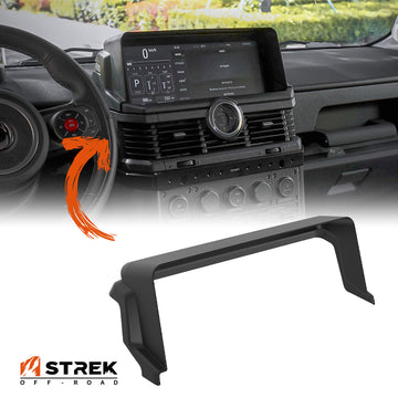 Matte black anti-glare cover installed on Ineos Grenadier dashboard using 3M adhesive