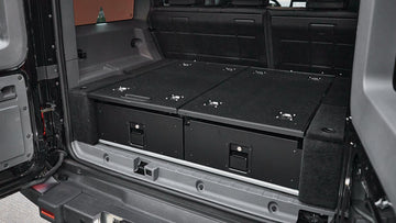 STREK OFF ROAD Rear Trunk Cargo Drawer System installed in INEOS Grenadier 2023-2026 showing organized storage compartments