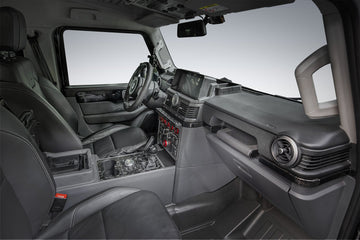 Complete Strek Offroad cabin organizer and storage upgrades installed inside an Ineos Grenadier cockpit.