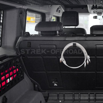 3D printed adhesive hook holding a phone cable inside a car