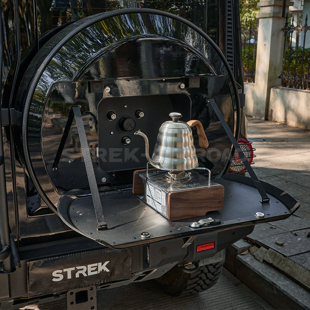 STREK OFF ROAD spare tire cover with folding table on Ineos Grenadier