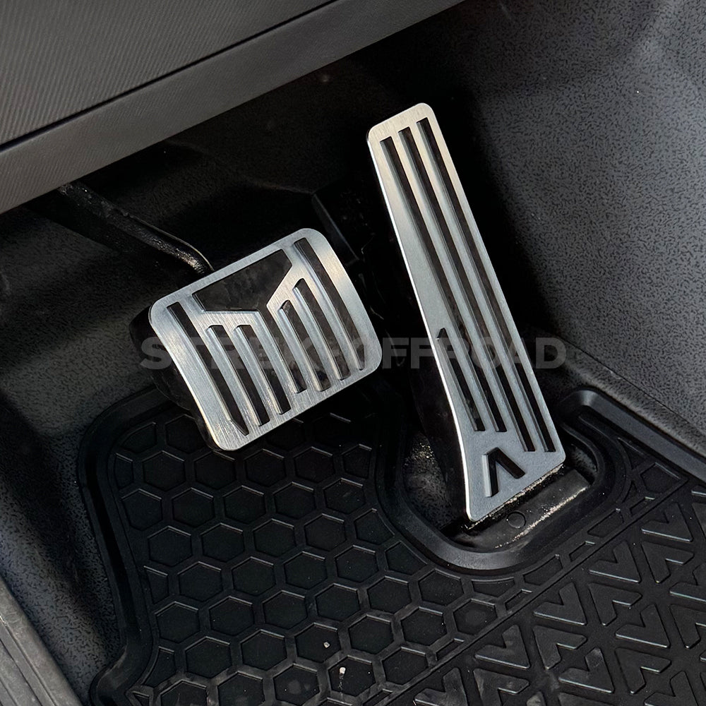 Anti-skid metal and rubber pedal covers installed in Ineos Grenadier