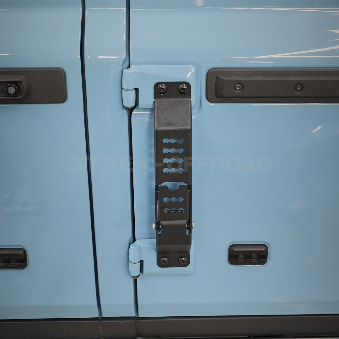 Folding door hinge step installed on Ineos Grenadier