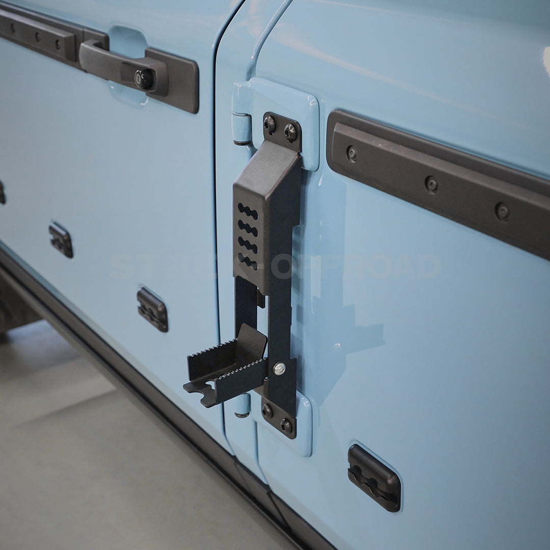 Folding door hinge step installed on Ineos Grenadier