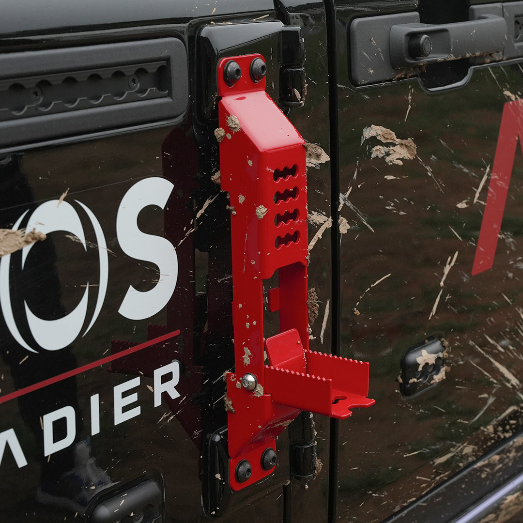 Ineos Grenadier Door Hinge Step red installed on door hinge for rooftop access - Strek Offroad