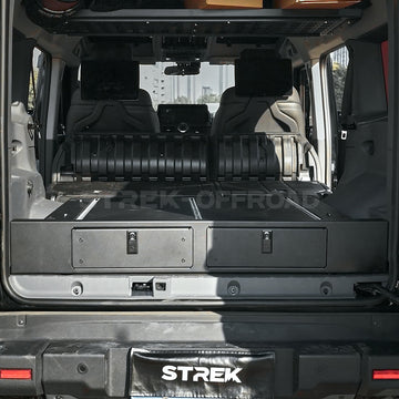 drawer system creating a flat floor with Grenadier rear seats folded