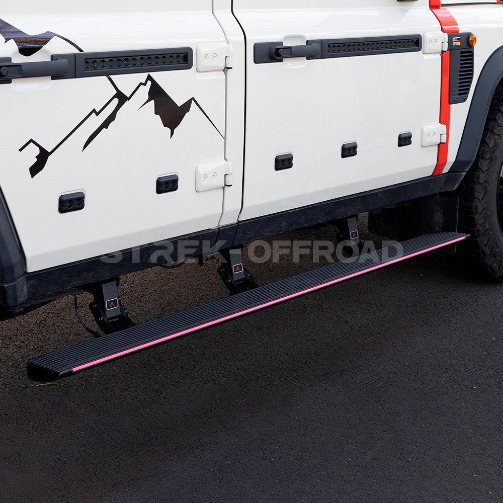 Electric running boards with LED lights installed on Ineos Grenadier