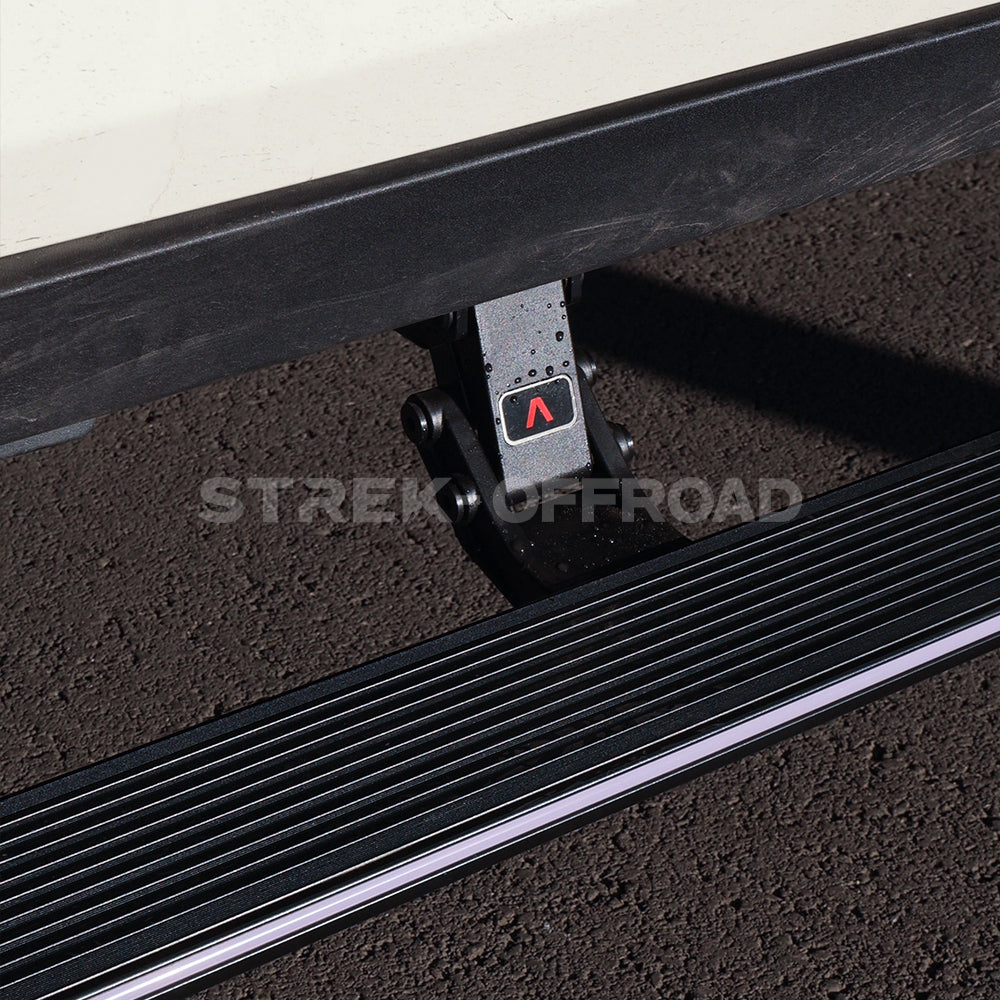 Electric running boards with LED lights installed on Ineos Grenadier
