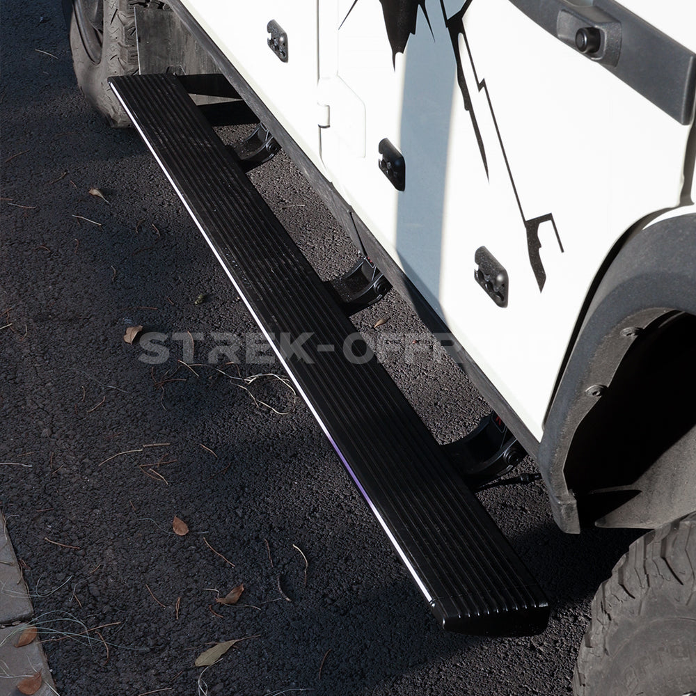 Electric running boards with LED lights installed on Ineos Grenadier