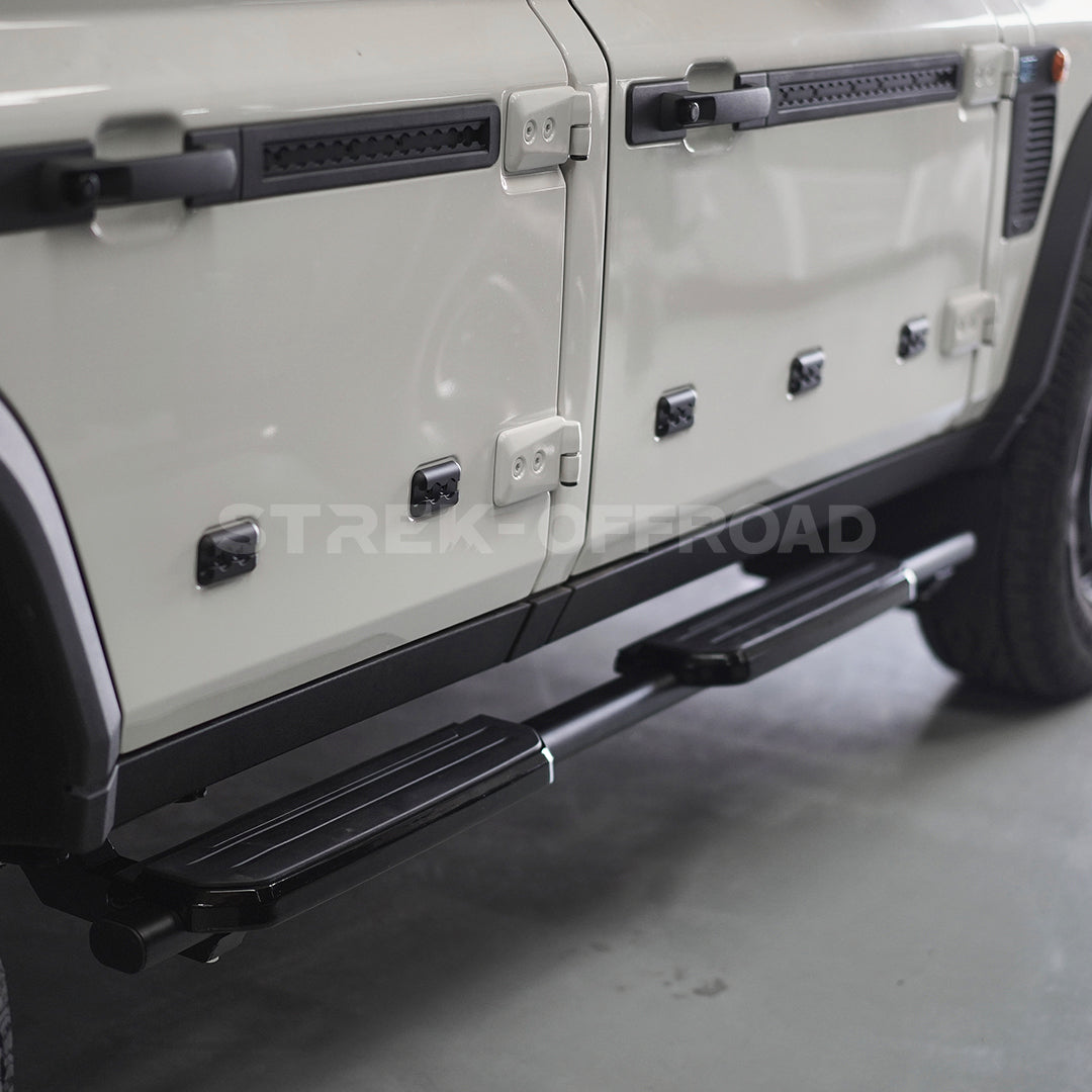 Fixed side steps with Defender styling installed on Ineos Grenadier
