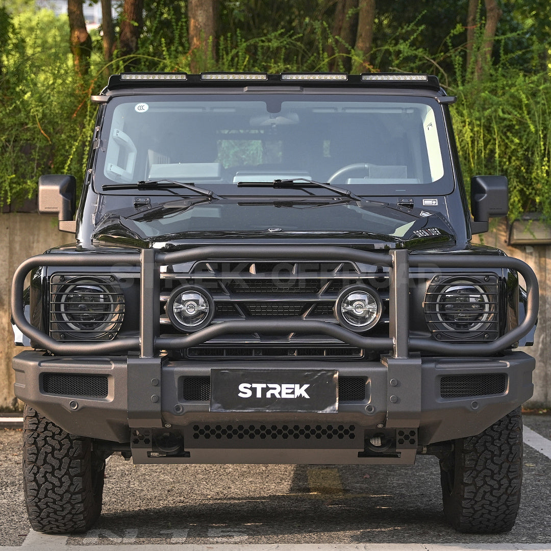 Black metal headlight guards installed on Ineos Grenadier