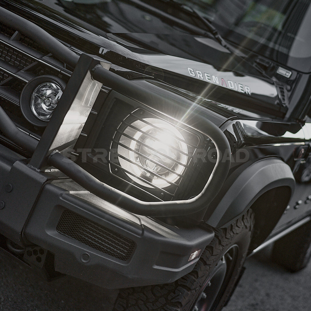 Black metal headlight guards installed on Ineos Grenadier