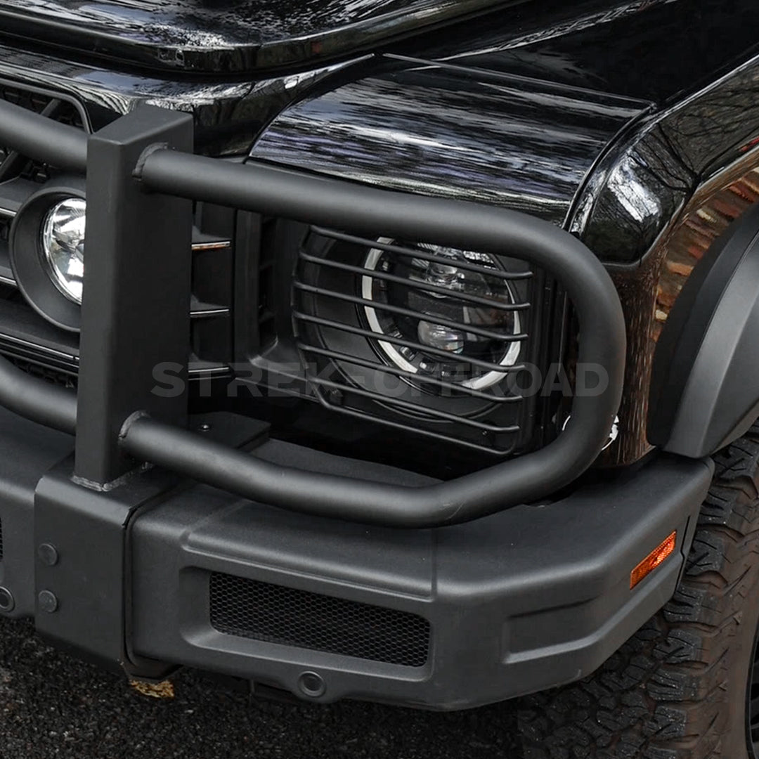 Black metal headlight guards installed on Ineos Grenadier