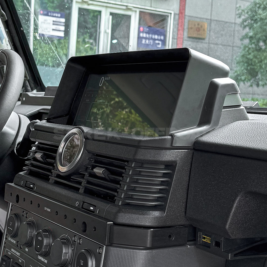 Matte black anti-glare cover installed on Ineos Grenadier dashboard using 3M adhesive