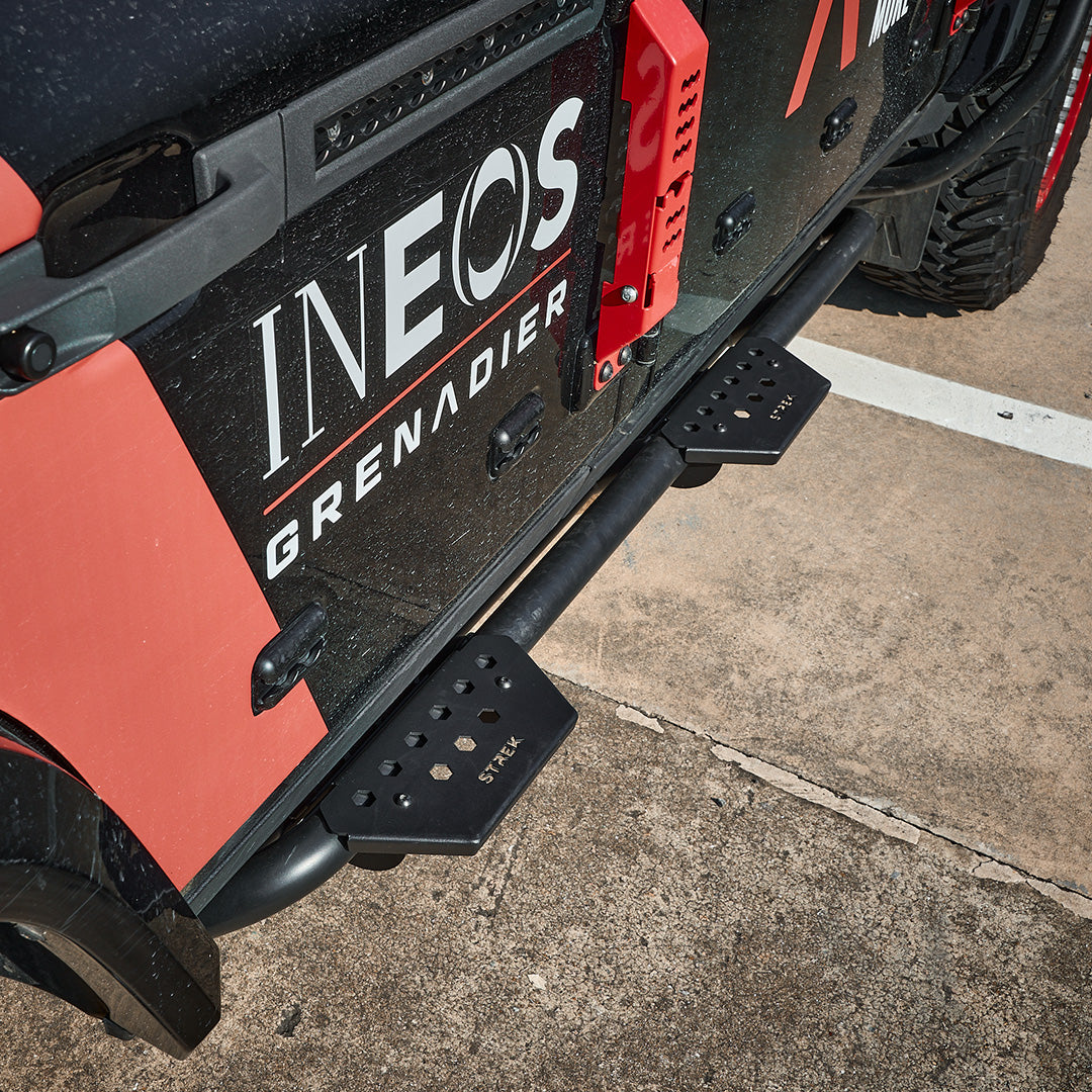 ineos-grenadier-side-steps-rock-slider-clamp-installed-installed-on-vehicle-rock-slider-demonstration-demonstration-demonstration-demonstration-demonstration-demonstration