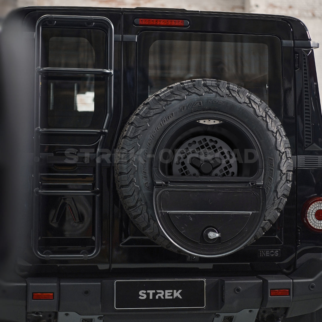 Strek Offroad spare tire expansion plate installed on INEOS Grenadier