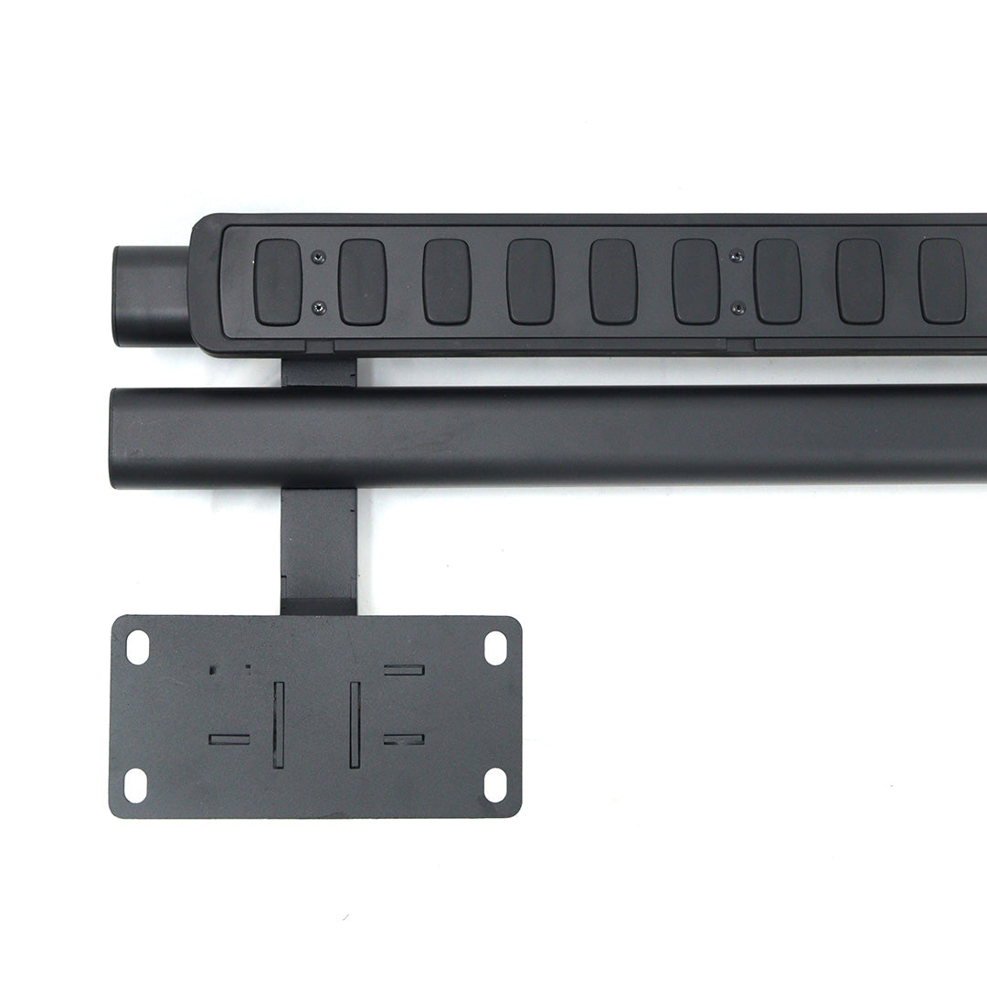 Close-up of the front mounting bracket, textured step pad, and dual tube profile on a black fixed running board for INEOS Grenadier Quartermaster.