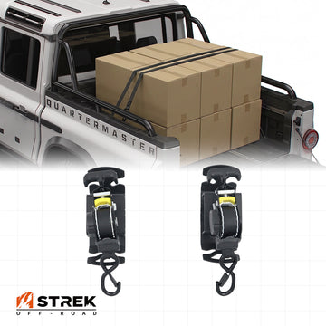 Retractable ratchet straps for Ineos Grenadier Quartermaster pickup bed with cargo boxes secured