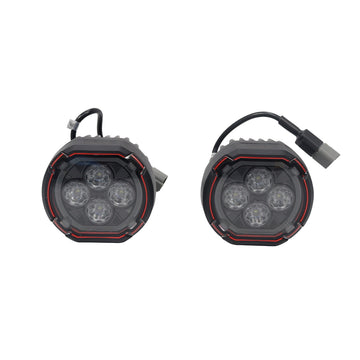 STREK Off Road front bumper round LED pod light kit showing one set of two matching lights, each with four inner projector lenses, red accent ring trim, and rear wiring cables, compatible with INEOS Grenadier.