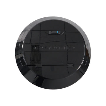 STREK Off Road spare tire cover component of the integration kit designed for INEOS Grenadier, matte black texturized finish on a white background.