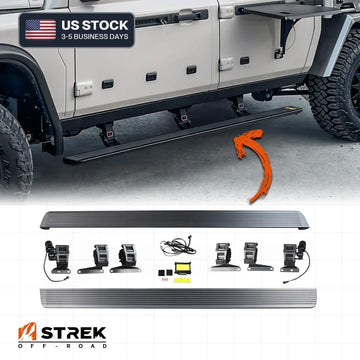 Electric deployable side steps with illuminated LED lighting strip installed on an INEOS Grenadier Quartermaster, shown alongside motor brackets, control module, and wiring harness.