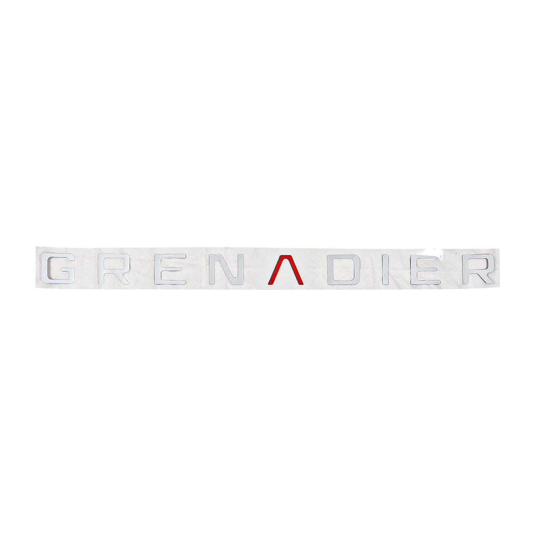 Silver GRENADIER tailgate inlay decal with red A accent on a white background for INEOS Grenadier Quartermaster.